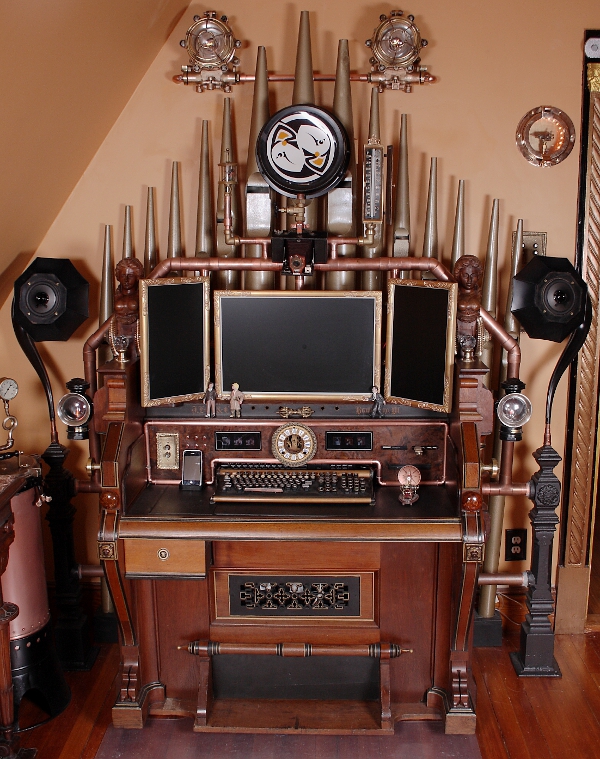 [http://steampunkworkshop.com/sites/default/files/images/Steampunk-organ-cockpit-desk%20(15).JPG]