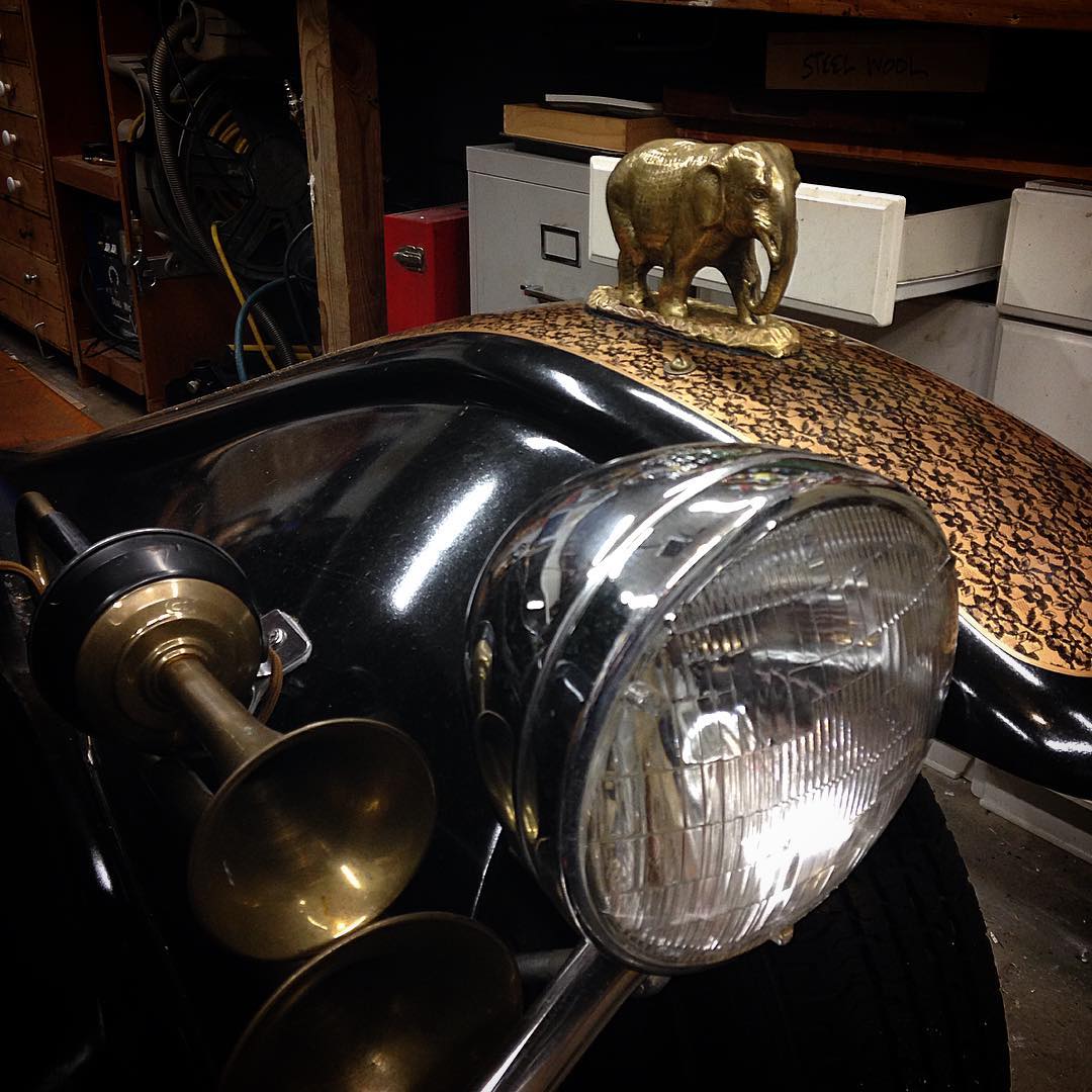 Replaced the non-functional fender-mounted rear-view mirrors with elephants. Like you do.