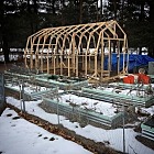 Framing for the greenhouse is done. The wood will be primed and painted the same color as the beds but I won