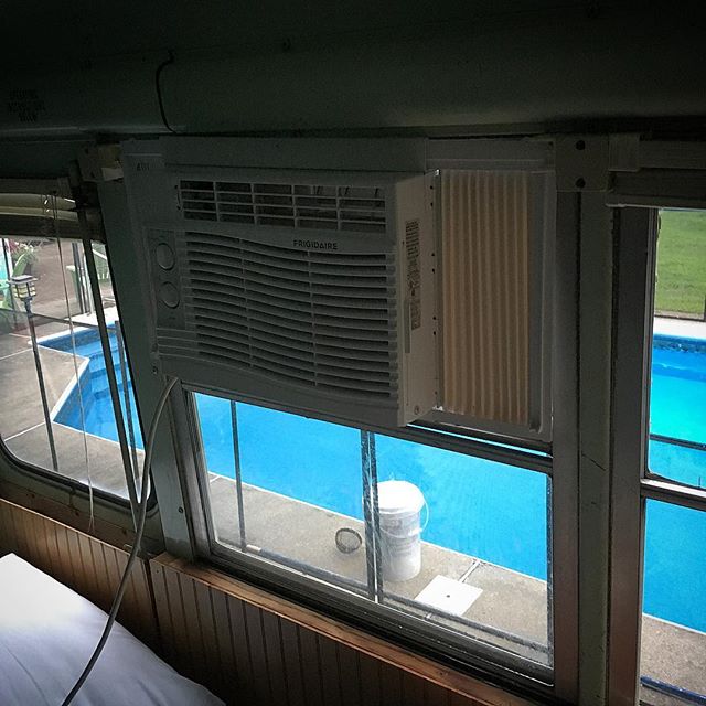 Interesting! The $130 air conditioners from Amazon fit in an unmodified school bus window.