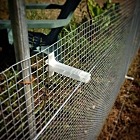 3D printed electric fence supports. Welcome to Jurassic Garden!
