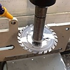 Little woodworking trim saw does a great job on steel for a fraction of the price of a real slitting saw.